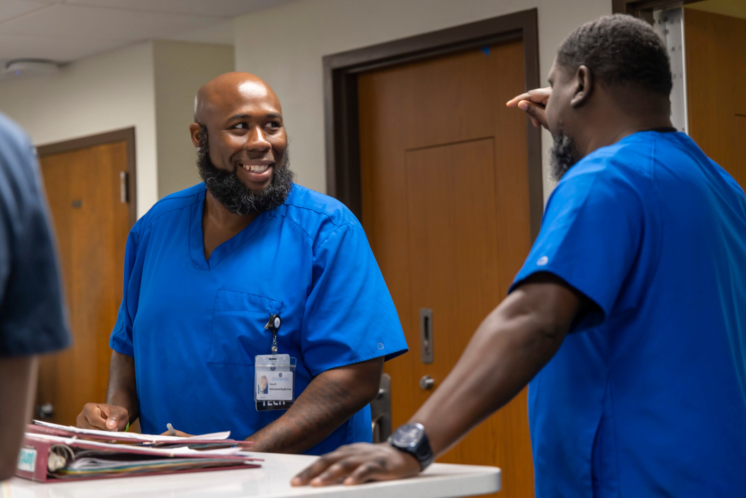 Centerstone team member speaking with a colleague