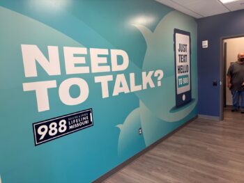 CStone 988 mural Marshfield A mural encourages Centerstone clients in crisis to use 988 call, text or chat options. The mural is located at a Centerstone clinic in Marshfield, Missouri.
