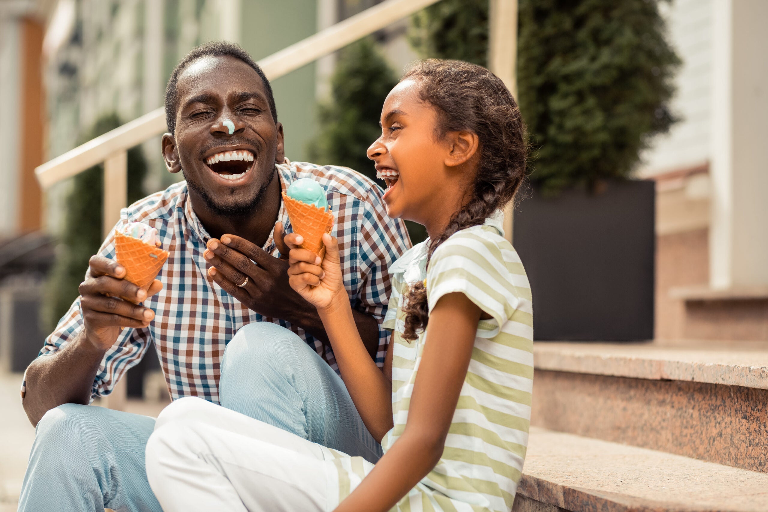 Amazing little female laughing at her daddy