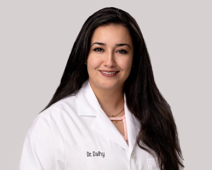 Portrait of El Khansaa Dalhy, D.O. in a white lab coat