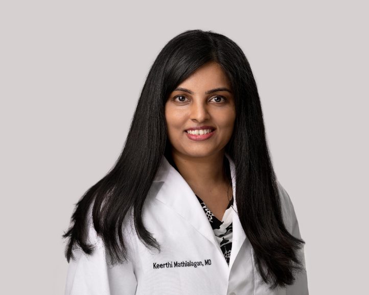 Portrait of Keerthika Mathialagan, M.D. in a white lab coat